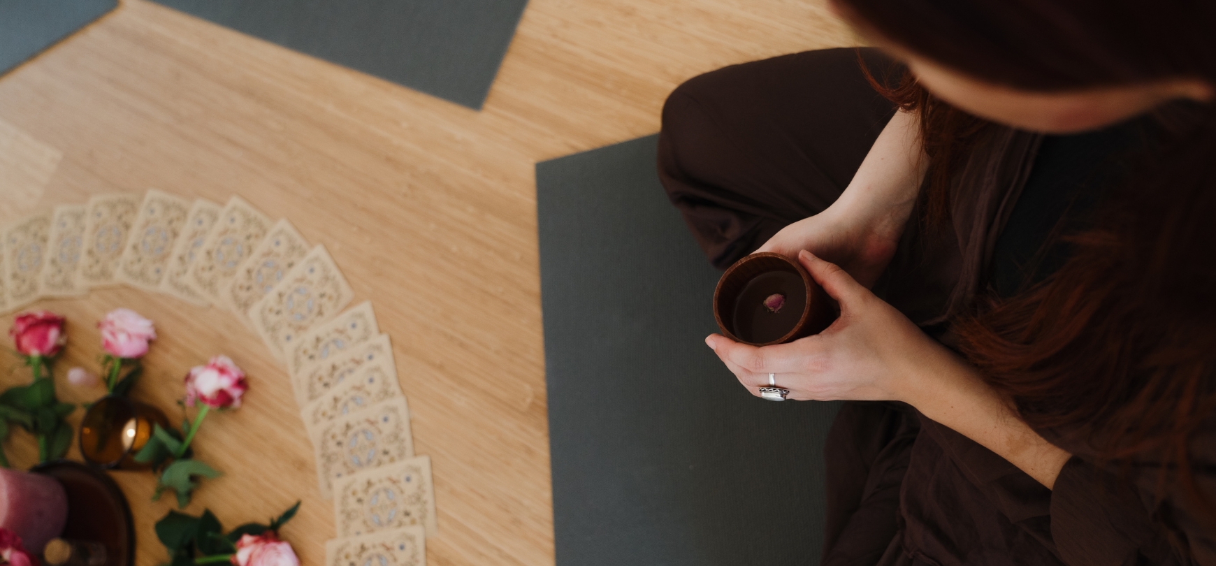 Woman drinking cacao during a ceremony at De Nieuwe Yogaschool